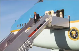  ?? Doug Mills / New York Times ?? President Trump disembarks from Air Force One at Joint Base Andrews in Maryland days after ordering a missile strike on Syria for a chemical weapon attack on Syrian civilians.