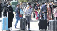  ?? DEEPAK SANSTA/HT ?? Tourists on The Ridge in Shimla on Friday. People coming from outside the state are being sent back.