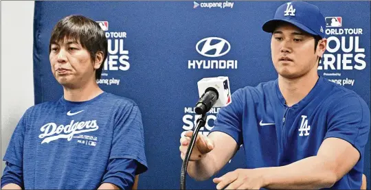  ?? JUNG YEON-JE/AFP VIA GETTY IMAGES/TNS ?? The Dodgers were quick to fire Ippei Mizuhara (left), the interprete­r for star player Shohei Ohtani, after reports from the Los Angeles Times and ESPN regarding Mizuhara’s alleged ties to an illegal bookmaker and debts that totaled well over $1 million. It’s the latest in a long list of betting scandals that rocked sports.