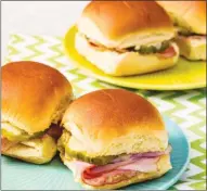  ?? The Associated Press ?? This recipe for Ham and cheese sliders appears in The Complete Cookbook for Young Chefs.