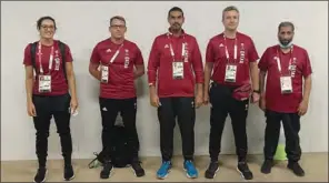  ??  ?? Qatar’s skeet shooter Mohamed Al Rumaihi (centre) and rower Tala Abujbara (left) with officials prior to their departure for Tokyo from Doha on Friday.