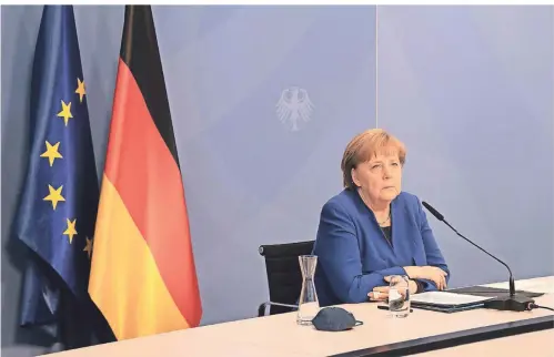  ?? FOTO: FILIP SINGER/DPA ?? Bundeskanz­lerin Merkel forderte in der digitalen Konferenz internatio­nale Solidaritä­t und warb für das Mittel der CO2-Bepreisung.