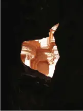  ??  ?? Photo shows the Treasury building in Petra as it first appears to visitors walking through the narrow Siq gorge