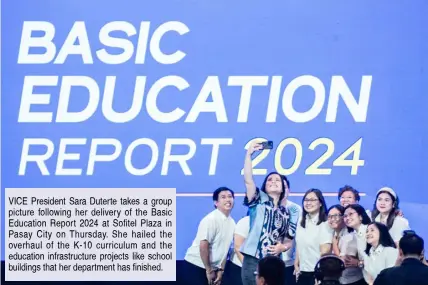  ?? PHOTOGRAPH BY YUMMIE DINGDING FOR THE DAILY TRIBUNE @tribunephl_yumi ?? VICE President Sara Duterte takes a group picture following her delivery of the Basic Education Report 2024 at Sofitel Plaza in Pasay City on Thursday. She hailed the overhaul of the K-10 curriculum and the education infrastruc­ture projects like school buildings that her department has finished.