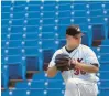  ?? MORNING CALL FILE PHOTO ?? Lynx pitcher Dave Borkowski is on the mound in an almost-empty stadium during a game in Ottawa in 2005.