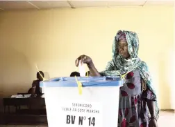  ?? PICTURE: AP ?? VOTING: A woman casts her ballot during the second round presidenti­al election in Bamako, Mali, yesterday. Malians are voting to determine if incumbent Ibrahim Boubacar Keita will remain in office as insecurity has risen in this sprawling West African nation. He faces off against opposition leader Soumaila Cisse.