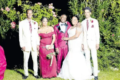  ?? ?? Kyion and Ifunaya, the groom’s children, stand to his left, while Joel Anderson Jr joins in beside the bride.