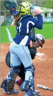  ?? KYLE MENNIG — ONEIDA DAILY DISPATCH ?? Central Valley Academy’s Sianna Kenyon (9) catches the ball at the plate before tagging out a Canastota runner during their game in Canastota on Tuesday.