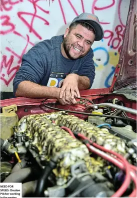  ?? Picture: EUGENE COETZEE ?? NEED FOR SPEED: Cheston Pilcher working in the engine bay of his Nissan Sentra 200STI at the Japworx workshop in Kariega