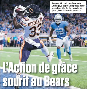  ?? PHOTO AFP ?? Taquan Mizzell, des Bears de Chicago, a capté une passe pour le majeur à la fin du deuxième quart, hier à Detroit.