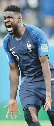  ?? PETR DAVID JOSEK/THE ASSOCIATED PRESS ?? France’s Samuel Umtiti celebrates his team’s 1-0 victory over Belgium during their World Cup semifinal Tuesday in St. Petersburg, Russia. Umtiti scored the match’s decisive goal.