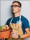  ??  ?? Hugh Acheson, the driving force behind several Athens and Atlanta restaurant­s, developed 100 recipes for “The Chef and the Slow Cooker.”