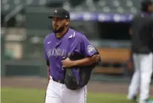  ?? David Zalubowski, The Associated Press ?? Rockies starting pitcher Antonio Senzatela gets to work at Coors Field last week.