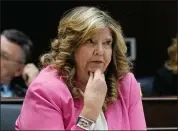  ?? GEORGE WALKER IV — THE ASSOCIATED PRESS FILE ?? Rep. Gloria Johnson, R-knoxville, listens during a House Criminal Justice Committee meeting, Feb. 20, 2024, in Nashville, Tenn. Johnson, now running as a Democrat for the U.S. Senate against Republican incumbent Marsha Blackburn, has joined the growing ranks of progressiv­e candidates choosing to tell their own abortion stories. They are doing so more frequently in states that have banned abortion in the aftermath of the U.S. Supreme Court’s
2022 decision to overturn Roe v. Wade.