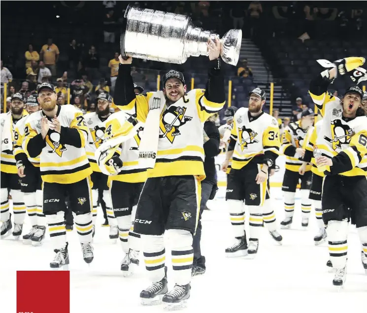  ?? FREDERICK BREEDON/GETTY IMAGES ?? Sidney Crosby and the Pittsburgh Penguins will look to do what no other team has done since the 1982-83 New York Islanders — win a third straight Stanley Cup when the 2017-18 season is all said and done.