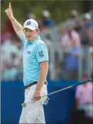  ?? The Associated Press ?? Brandt Snedeker raises his arm after sinking an eagle putt on the 15th hole during the second round of the Wyndham Championsh­ip in Greensboro, N.C., Friday.