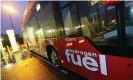  ??  ?? A hydrogen powered bus is refuelled at a depot in London. Photograph: Graeme Robertson/The Guardian