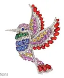  ??  ?? Colibrì brooch in white gold with diamonds and coloured gemstones