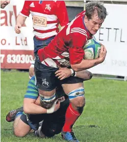  ?? Pictures: Gareth Jennings. ?? Top: Action from Howe’s clash with Hamilton Bulls; above: captain James Lawrie is brought crashing to the ground; right: Will Wardlaw is stopped in his tracks by a Bulls opponent.