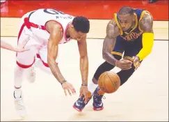  ?? Associated Press photo ?? In this May 27, 2016, file photo, Cleveland Cavaliers forward LeBron James, right, steals the ball from Toronto Raptors guard DeMar DeRozan (10) during the first half of Game 6 of the NBA basketball Eastern Conference finals in Toronto. Toronto and...