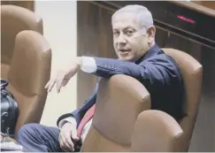  ??  ?? 0 Benjamin Netanyahu looked relaxed ahead of the vote