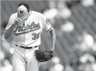 ?? GAIL BURTON/ASSOCIATED PRESS ?? Orioles starter Kevin Gausman turned in his worst performanc­e since his first game after the All-Star break, lasting only three innings against the Yankees and leaving with his team in a 5-0 hole.