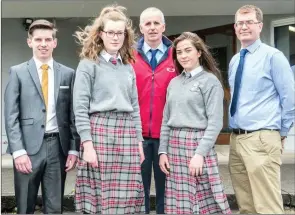  ??  ?? Thomas Fleming, Amy Dunphy, Owen Moynihan, Rachel Evans and Principal Joe O’Dwyer. Amy and Rachel were rewarded for their excellence in developing the school bank.