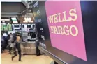  ??  ?? While its rivals are benefiting from rising interest rates and the Republican-passed tax cut, because of the numerous scandals, Wells Fargo has been ordered by the government to halt growth until further notice. RICHARD DREW/AP