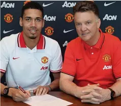  ?? MAN UTD ?? New deal: Smalling (left) extends his contract