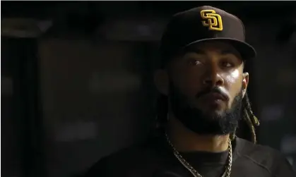  ?? Photograph: Charles Rex Arbogast/AP ?? The Padres' Fernando Tatis Jr looks out of the dugout during the fifth inning of a June game against the Cubs in Chicago.