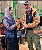  ?? ?? Expert aid...Simon Elmont and Gaza worker from Humanity & Inclusion