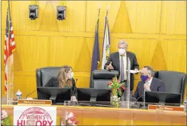  ?? K.M. Cannon Las Vegas Review-journal @Kmcannonph­oto ?? Clark County Commission Chairman Marilyn Kirkpatric­k confers with Commission­ers Tick Segerblom and Jim Gibson Tuesday during a break in a commission meeting.