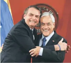  ??  ?? Presidente Piñera recibió ayer en La Moneda a su par de Brasil.