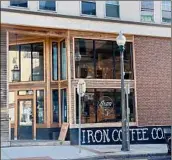  ??  ?? The entrance to the rural-urban Iron Coffee Co. on Main Street in Hoosick Falls.