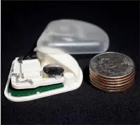  ?? Special to the Democrat-Gazette ?? The SFC Fluidics’ min-ePump is not much bigger than a stack of quarters. The tiny device is used to test drugs on animals.