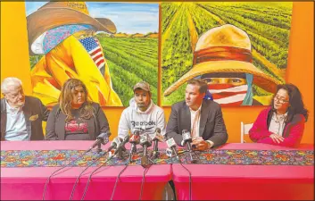  ?? Haven Daley
The Associated Press ?? Plaintiff Pedro Romero Perez, 24, center, sits next to his attorney Donald Magilligan, second from right, during a news conference Friday in Half Moon Bay, Calif.
