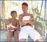  ??  ?? Portuguese football star Ronald and his first son, Ronaldo jr, 7, cradle newborn twins Matteo and Eva.