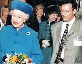  ??  ?? At her side: Dr Fisher had been on the monarch’s medical team since 2001