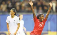 ?? Francisco Seco / Associated Press ?? Canada’s Nichelle Prince, right, celebrates after scoring against New Zealand on Saturday in Grenoble, France.
