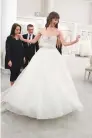  ??  ?? Bride Brynn O’Malley and her consultant­s in “Say Yes to the Dress”