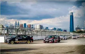  ??  ?? Tengku Djan Ley leads the pack in the Super Sporting Class of the Toyota Gazoo Racing Festival at Bandar Malaysia in Kuala Lumpur yesterday.