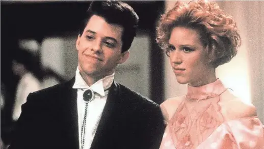  ?? PARAMOUNT HOME ENTERTAINM­ENT ?? Duckie (Jon Cryer) and Andie (Molly Ringwald) were not fated to end up together in “Pretty in Pink.” The movie is re-released on Blu-ray in the “John Hughes 5-Movie Collection.”