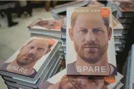  ?? KIN CHEUNG/AP ?? Copies of Prince Harry’s memoir “Spare” are displayed Jan. 10 at a bookstore in London. Many facets of the Duke of Sussex are revealed in eyebrow-raising detail in the book.
