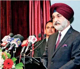  ??  ?? India's High Commission­er Taranjit Singh Sandhu delivering the Lalith Athulathmu­dali Oration. With him on the headtable were Parliament­arian Ravi Karunanaya­ke and Trustee Siri Fernando