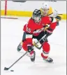  ?? CP PHOTO ?? In this Feb. 8, 2018, file photo, Ottawa Senators’ Erik Karlsson (65) is chased by Nashville Predators Kyle Turris (8) during first-period NHL hockey game action in Ottawa, Ontario.