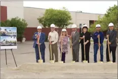  ?? PHOTO ?? ECRMC board members break ground for the Ancillary Service Building on Tuesday afternoon. FROM LEFT: Dr. Adolphe Edward, CEO; Oliver Alvarado, board member; Cheryl Viejas-Walker, El Centro mayor and board member; Joe Picazo, board president; Amanda...