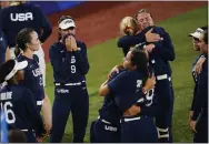  ?? MATT SLOCUM - THE ASSOCIATED PRESS ?? Members of team United States react after a softball game against Japan at the 2020Summer Olympics, Tuesday, July 27, 2021, in Yokohama, Japan. Japan won 2-0.