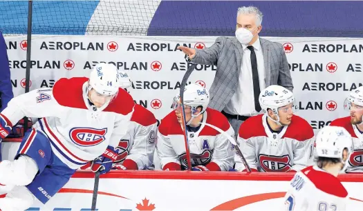  ?? JAMES CAREY LAUDER • USA TODAY SPORTS ?? Montreal Canadiens interim head coach Dominique Ducharme signals to a player during the first period against the Winnipeg Jets on Thursday night in Winnipeg.