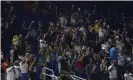  ?? Photograph: Wilfredo Lee/AP ?? Baseball fans pay tribute to the victims of the condo collapse in Surfside, Florida after a game between the Miami Marlins and the LA Dodgers on Monday.