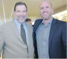  ??  ?? Rabbi Shaul Osadchey, left, and Dan Balaban, first vice-president of JNF Canada, are all smiles at the gala.